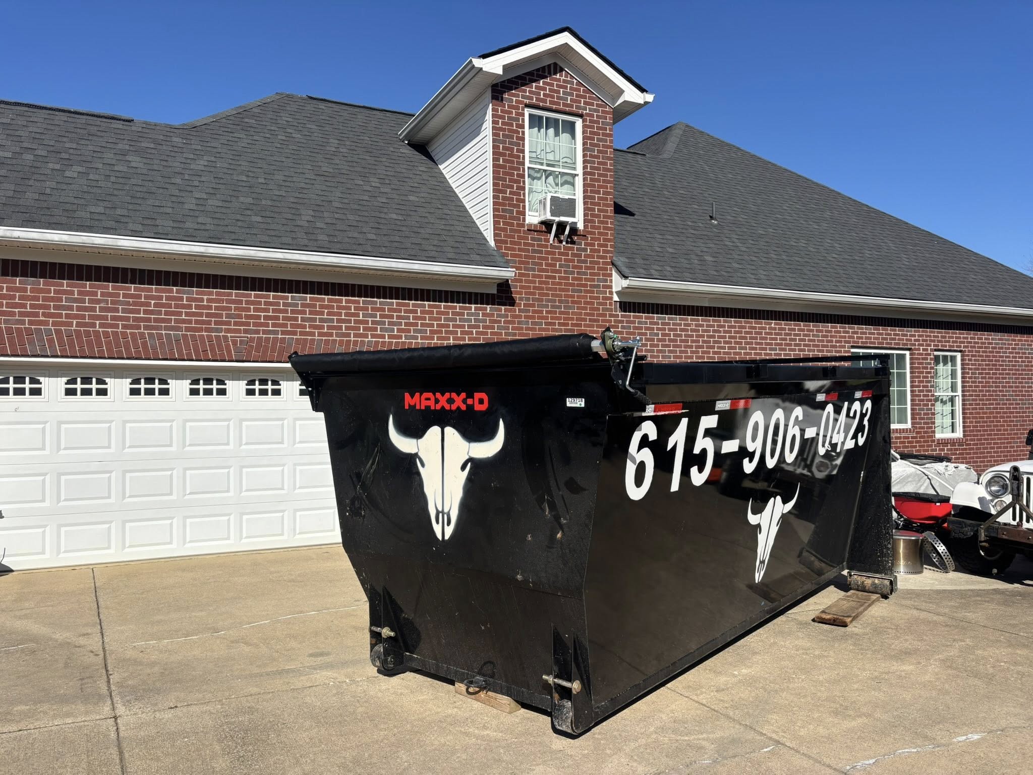 Dumpsteer dumpster at a residential home
